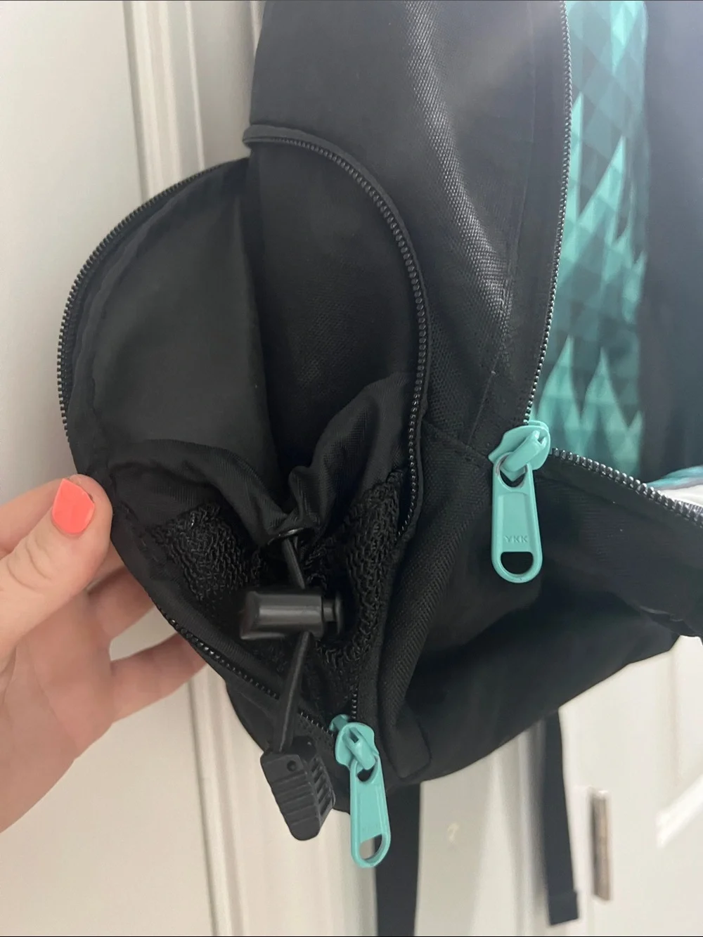 Dakine Black Backpack with Teal Accents